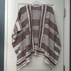 Open poncho with arm holes
